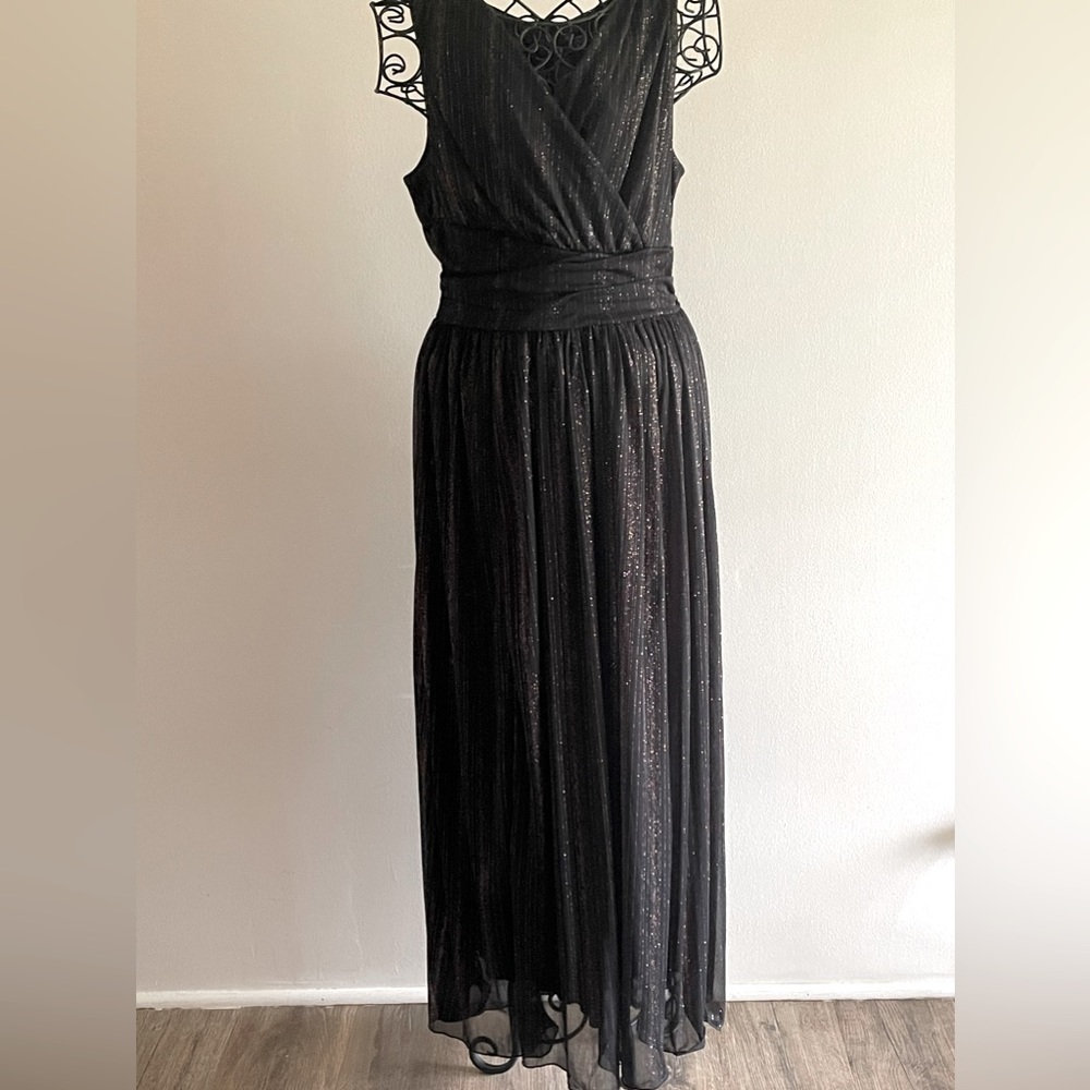 Black dress with glitter design.